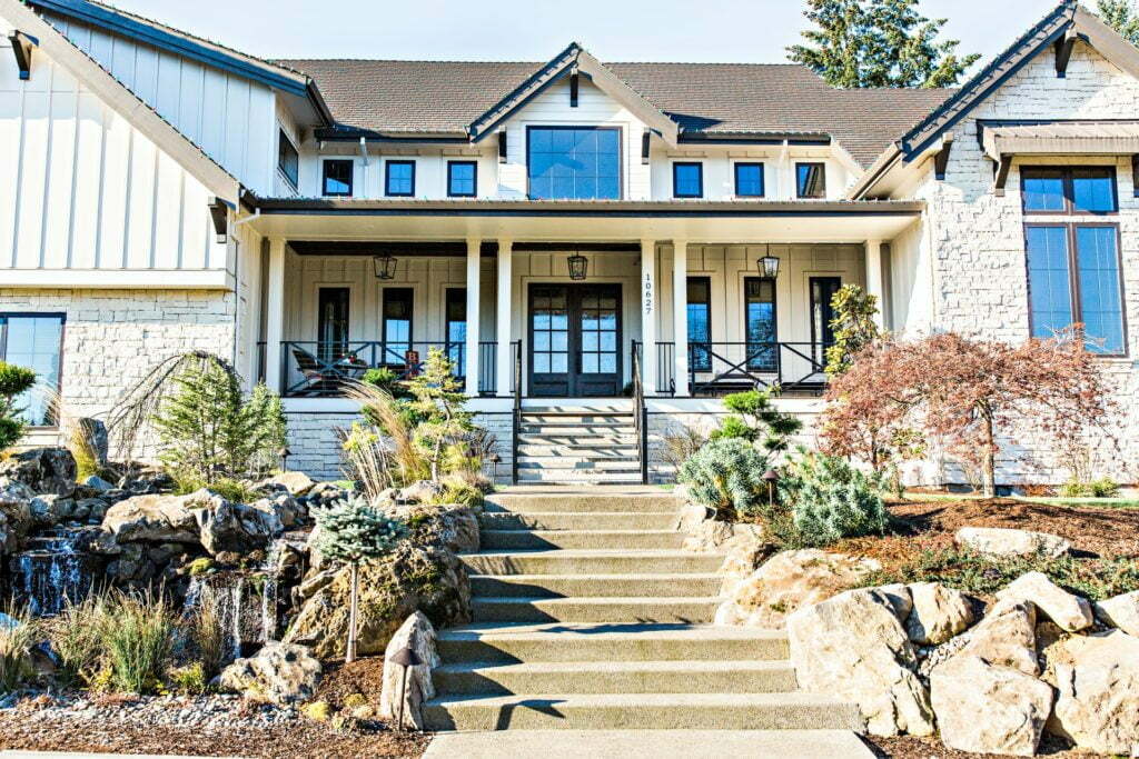 a house with a stone wall