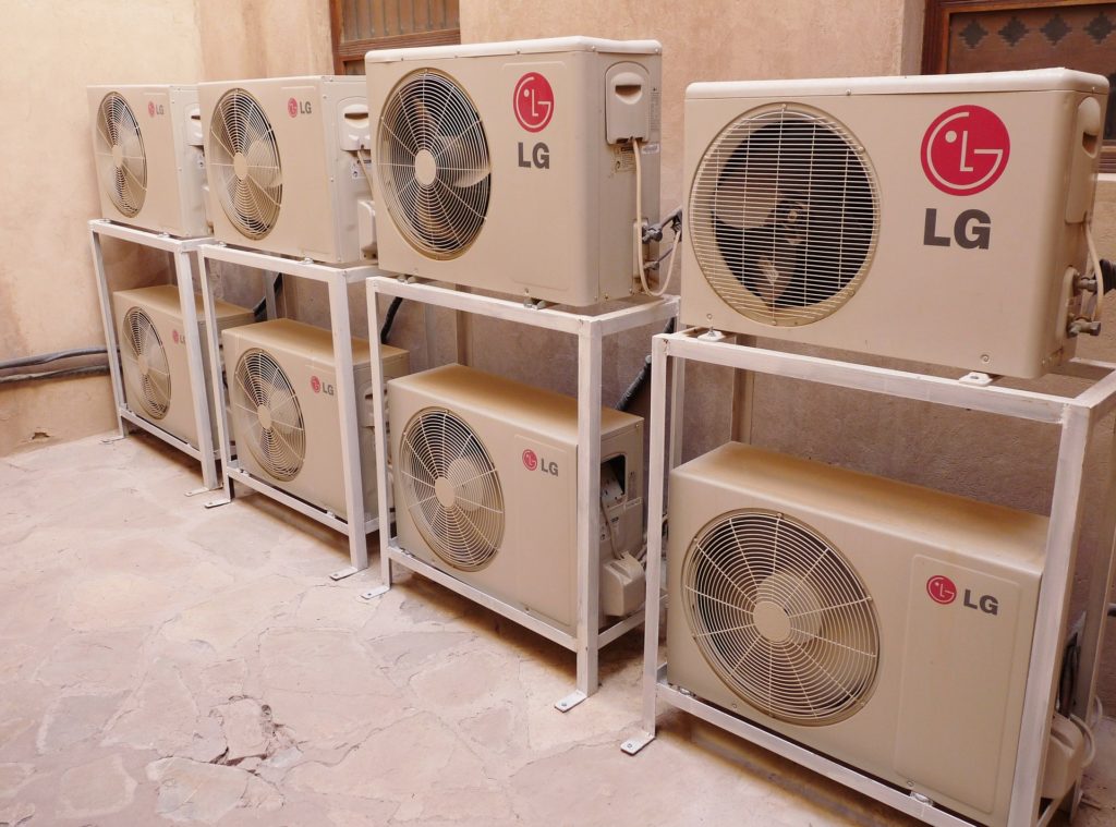 several white machines in a room