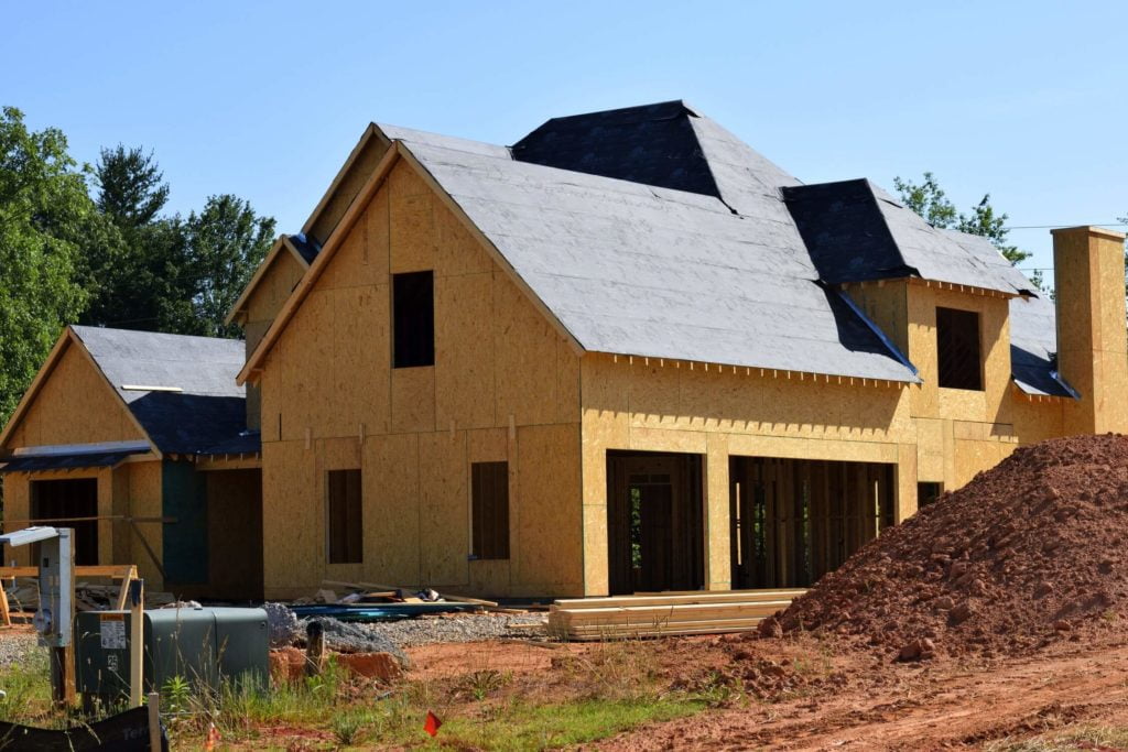 a house with a dirt yard